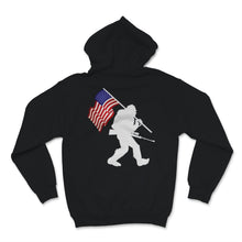 Load image into Gallery viewer, Bigfoot Holding Hunting Rifle Hunt Gun USA American Flag Vintage
